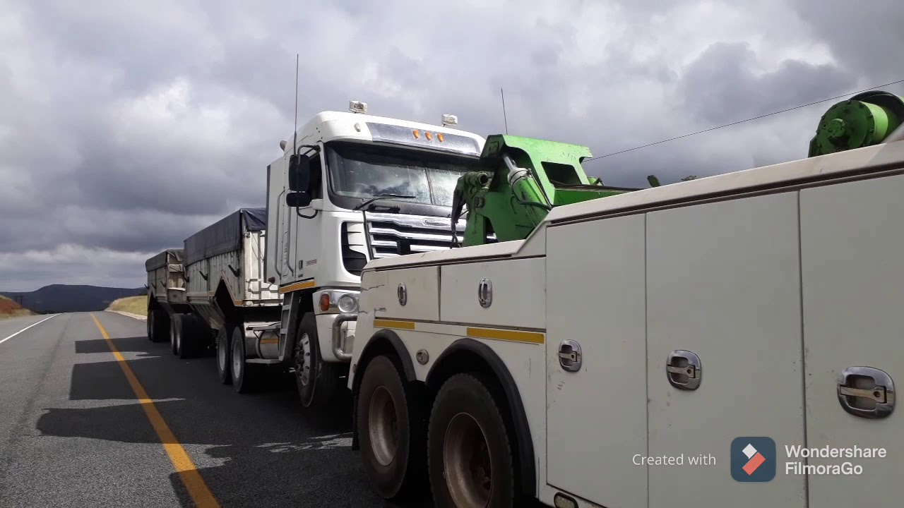 Western Star Towing a 500 Cummins Freightliner argosy from Botswana to South-Africa