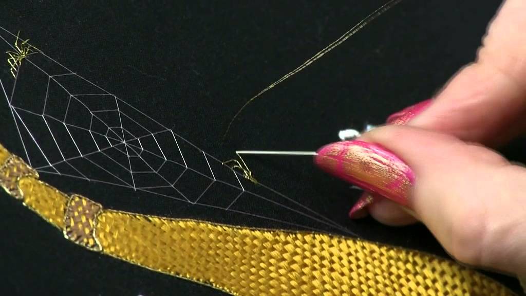 Helen M Stevens stitches a spider