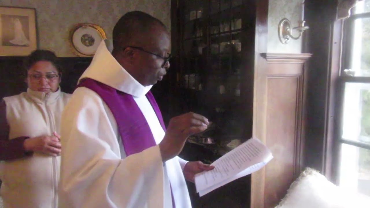 Fr Alex combining the exorcised Salt and Water at the WQPH Epiphany ceremony 3 of 4