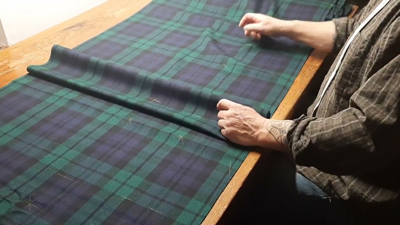 Making a new kilt   applying the measurements to the cloth