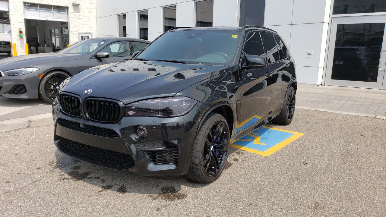 2017 BMW X5 M Black Sapphire Metallic with Mugello Red/Black Merino Leather Interior
