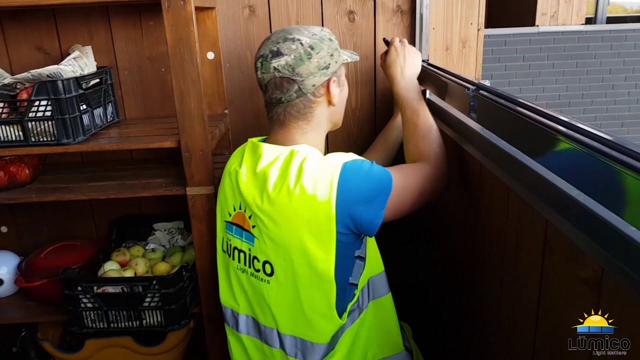 Installation of LÜMICO Frameless balcony glazing system