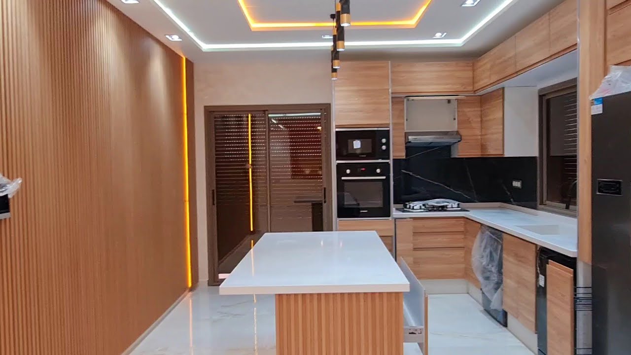 شقة 🏠على شكل فيلا للبيع بالقنيطرة بالمصعد و الحمام البلدي واجهتين😱