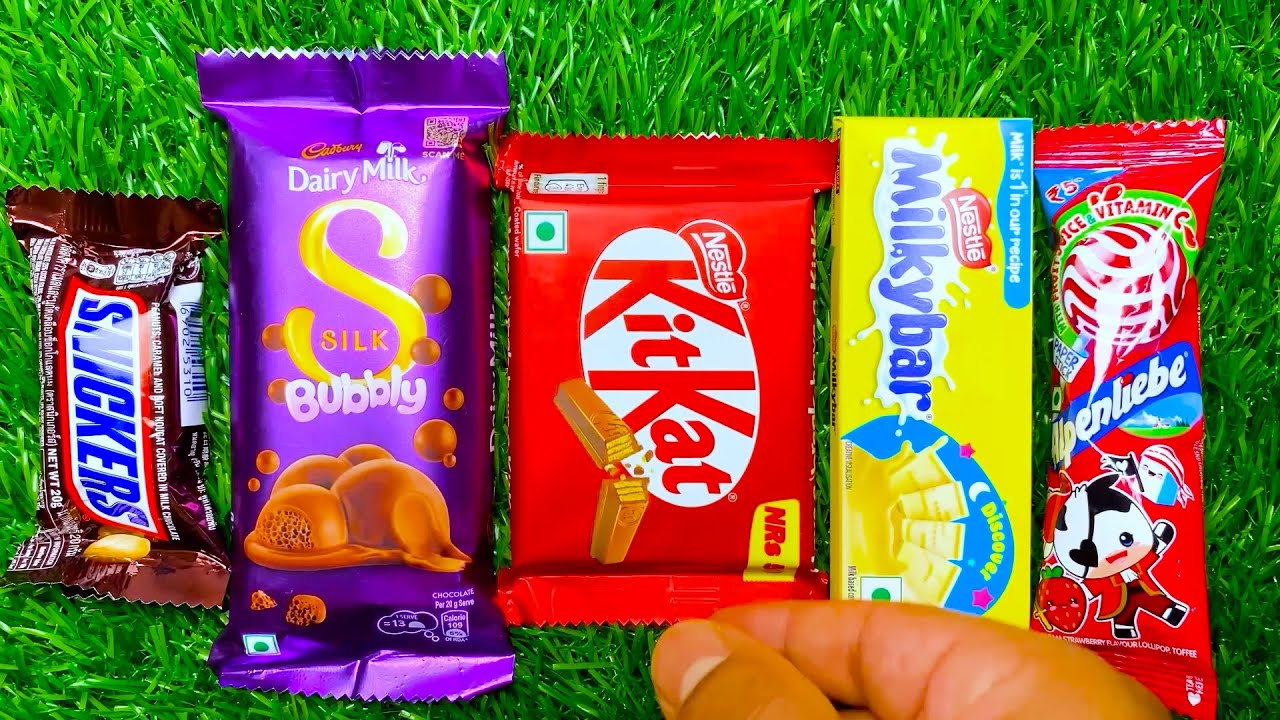 ASMR: Unboxing a Giant Mystery Box Full of Candy chocolate rainbow lollipops Satisfying video