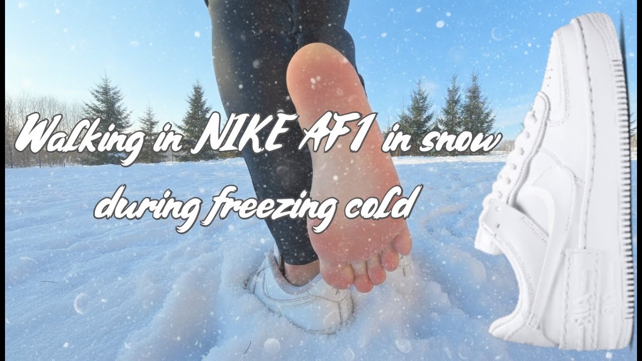 Walking barefoot in Nike AF1 Air force one during freezing cold and snow. Showing my feet and soles.