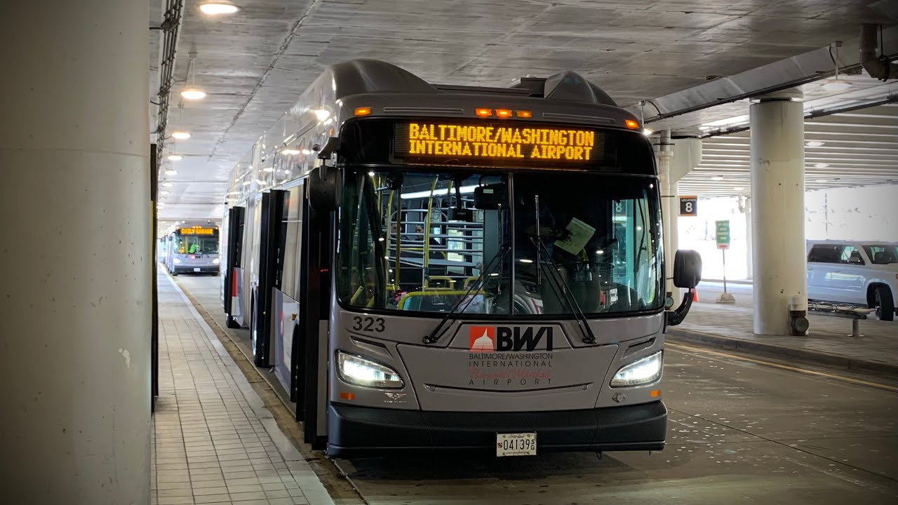 BWI Airport: 2017 New Flyer XN60 #323 on the Rental Car Facility Shuttle