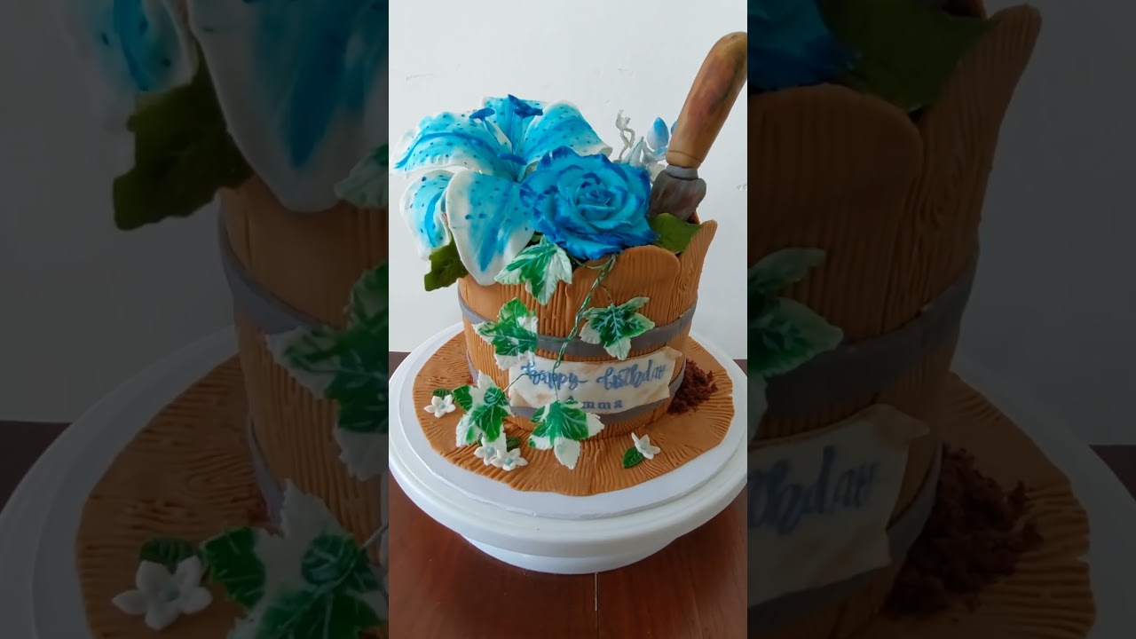 Gardening themed cake for mother's day or birthday with beautiful blue lily and Rose 🌹