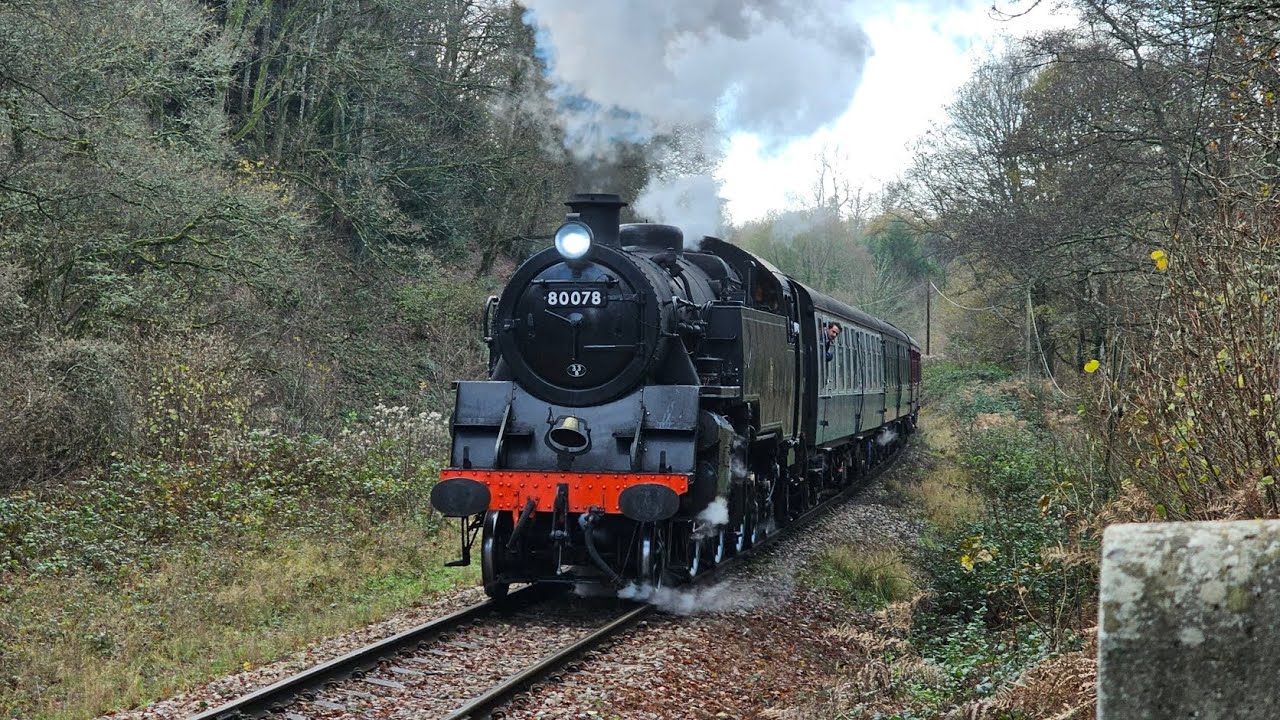 80078 barks its way past High Rocks Lane hauling The Polar Express at the Spa Valley Railway.