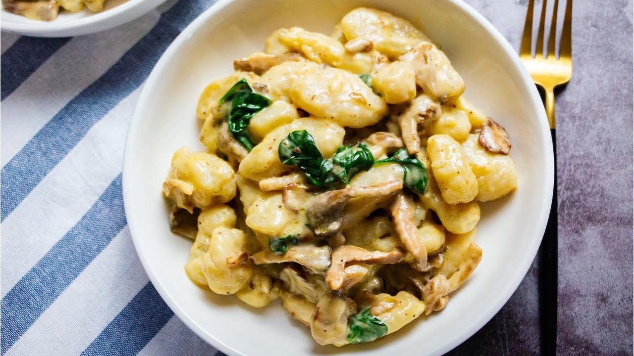 Homemade Gnocchi with Creamy Mushroom and Spinach Sauce