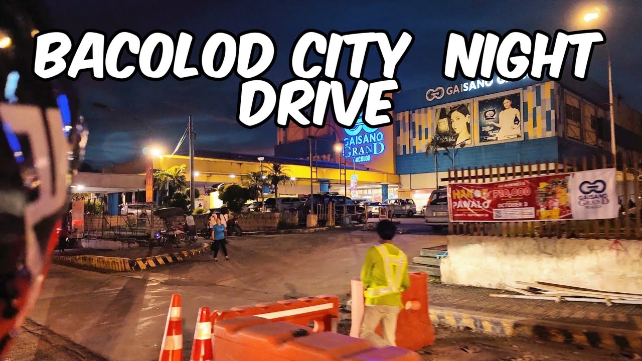 BACOLOD CITY DRIVE THROUGH AT NIGHT. NEGROS OCCIDENTAL PHILIPPINES 