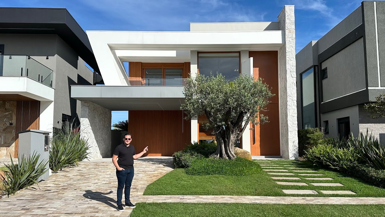 CASA BEIRA LAGO COM SOFISTICAÇÃO E MODERNIDADE, A VENDA NO CAPÃO ILHAS RESORT COM 4 SUÍTES E 320M²!