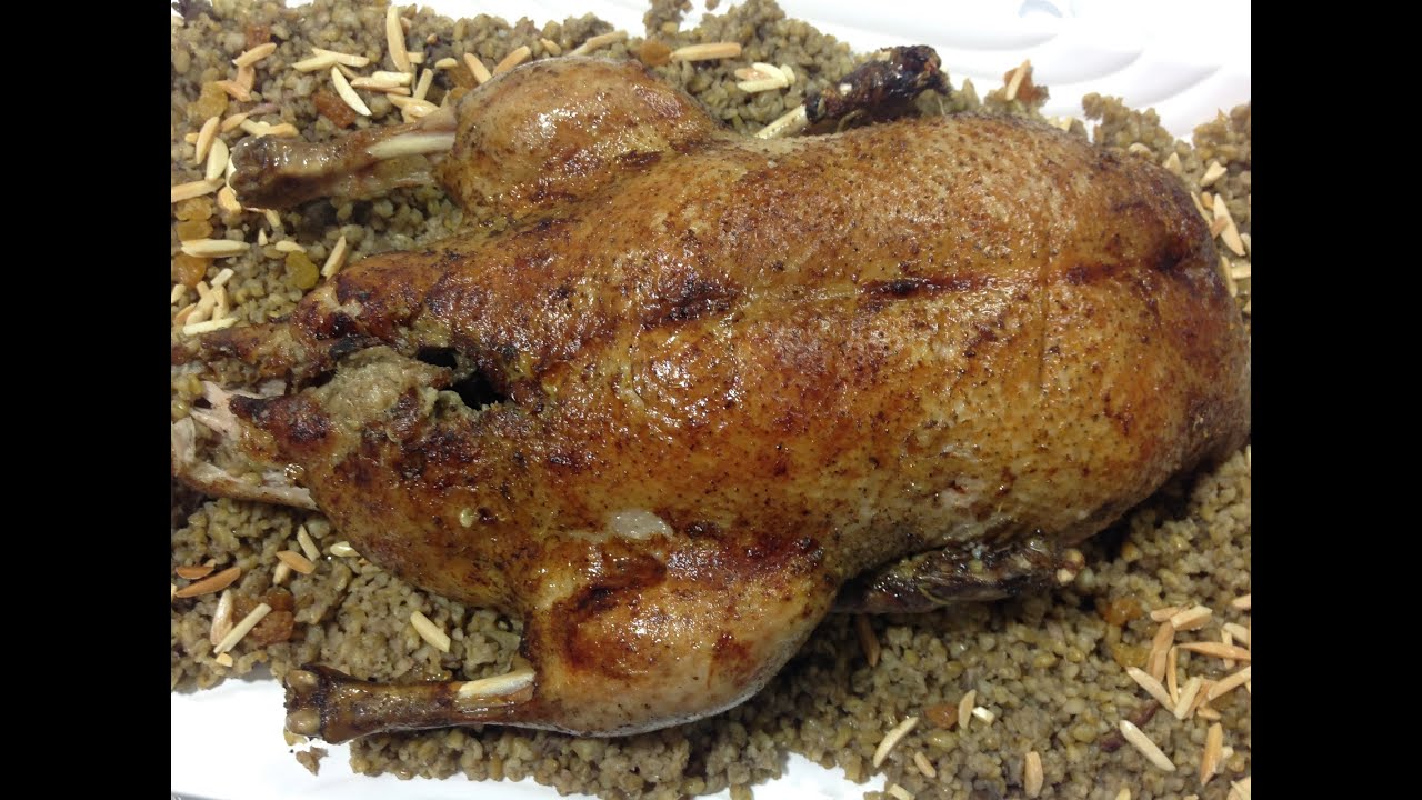 Roasted Duck With Green-Wheat Stuffing