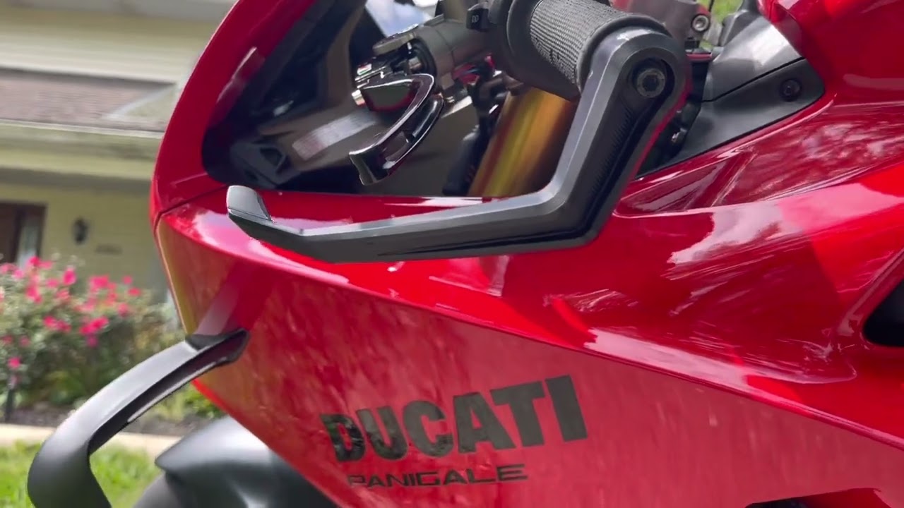 DB Race mirrors in red carbon fiber and DB race lever guards on my 2022 Ducati Panigale V4S.