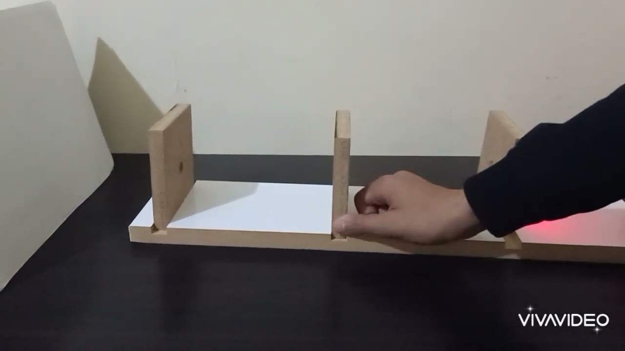 expérience de la propagation rectiligne de la lumière