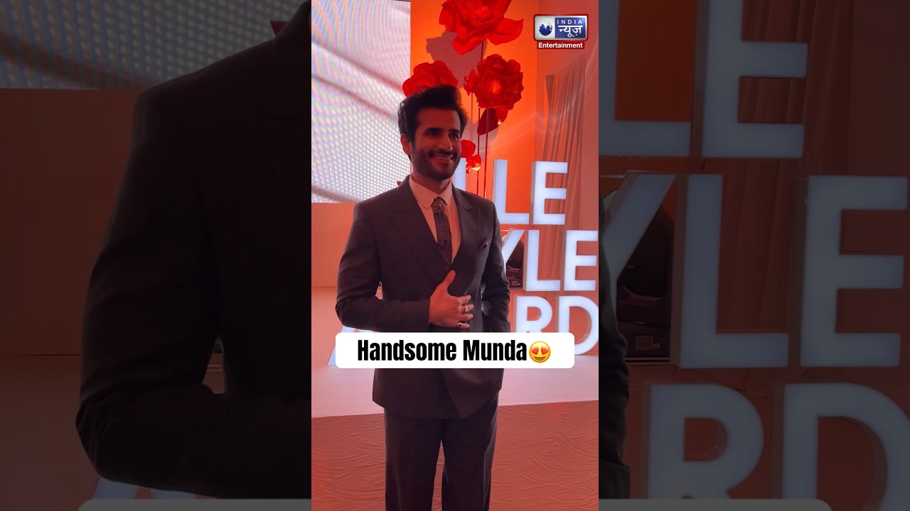 Karan Tacker stunned in a sharp, classic gray Raymonds suit at Elle Style Awards 