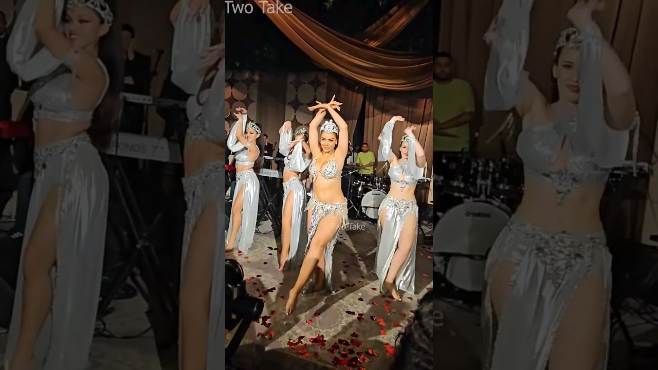 Badra belly dance performs with her band