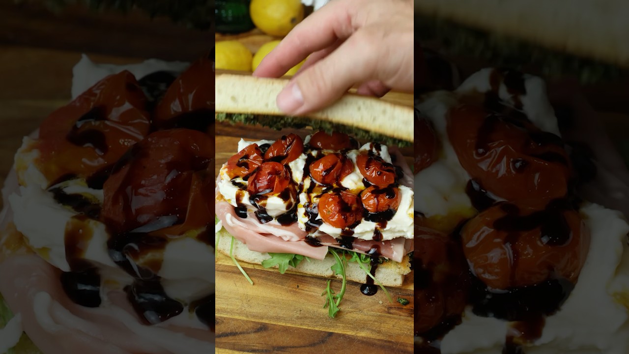 Burrata Caprese sandwich with hand chopped pesto, mortadella, and prosciutto 😍. #recipe