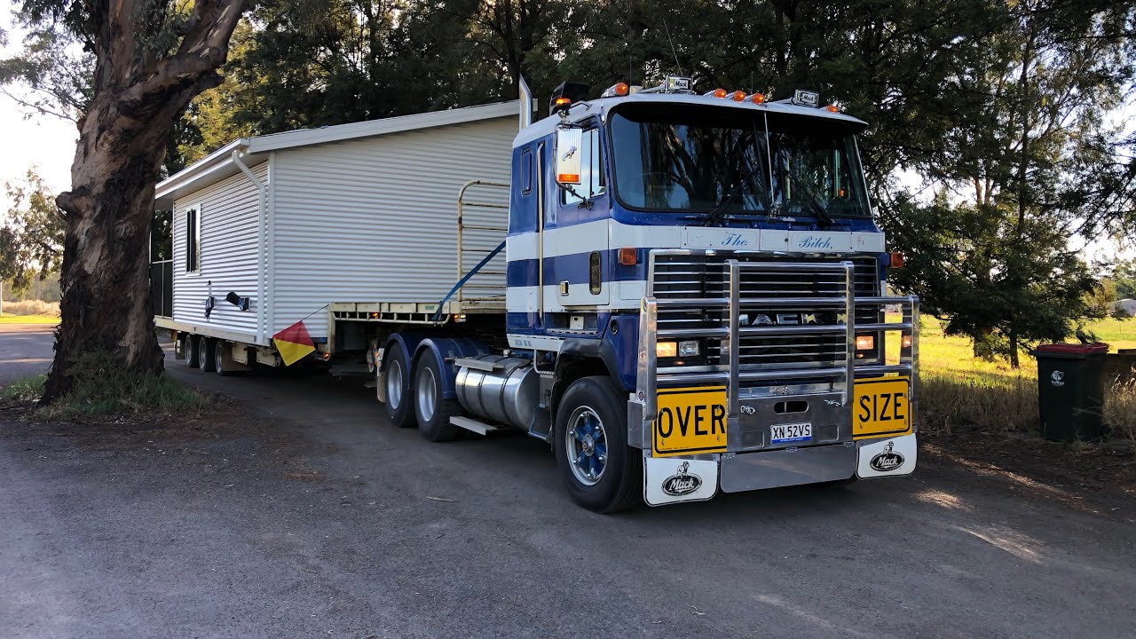 Carting house sections with a V8 Mack