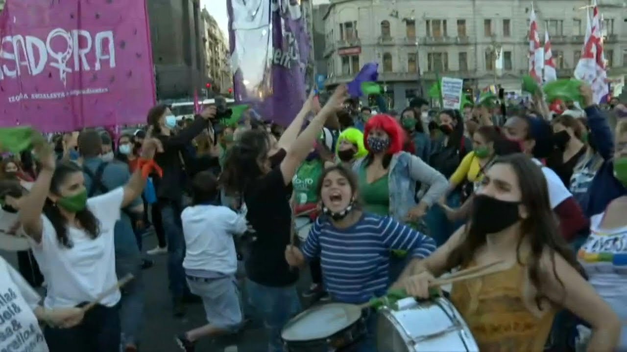 Argentine women hold up green scarves in demand for legal abortion | AFP