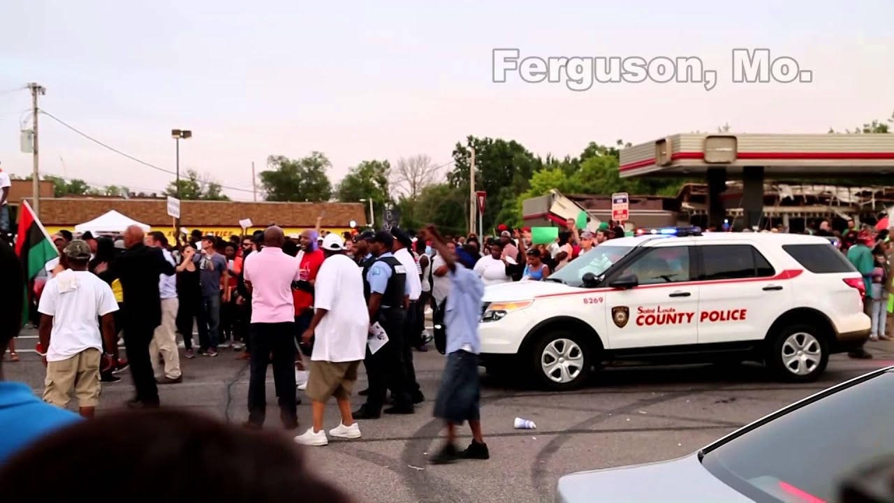 Tensions between police officers and protesters rise in Ferguson, Mo. *warning graphic language*
