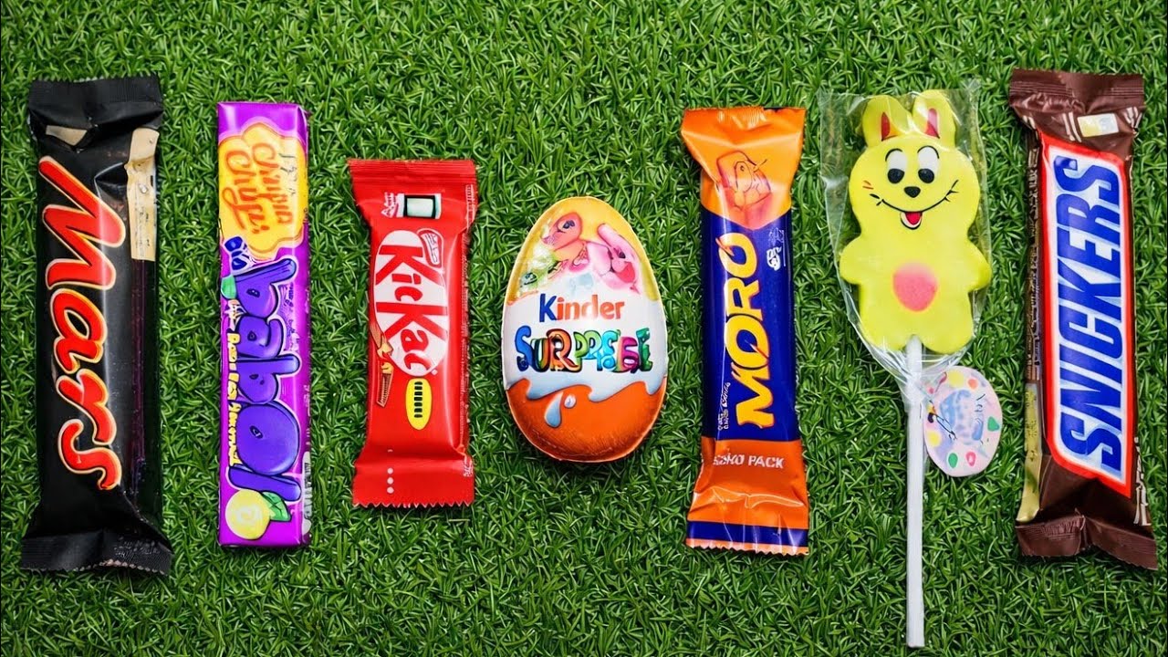 Most Asmr popular candys some lots of colorful rainbow lollipop candy unpacking chocolate eat