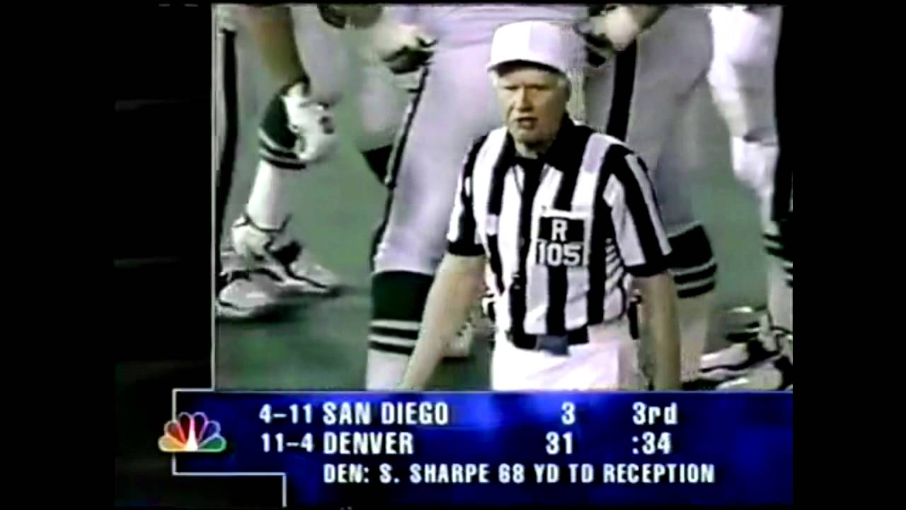Ref asks crowd to be quiet at football game.