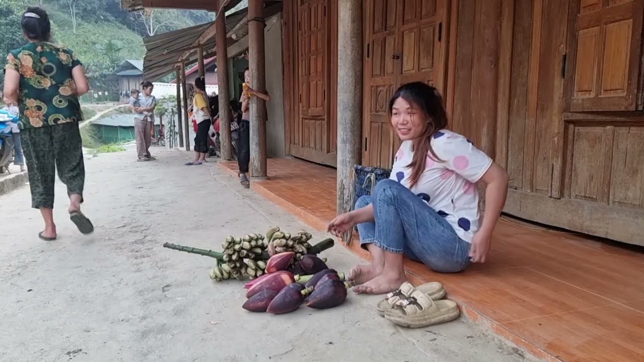 couple picking wild bananas to sell