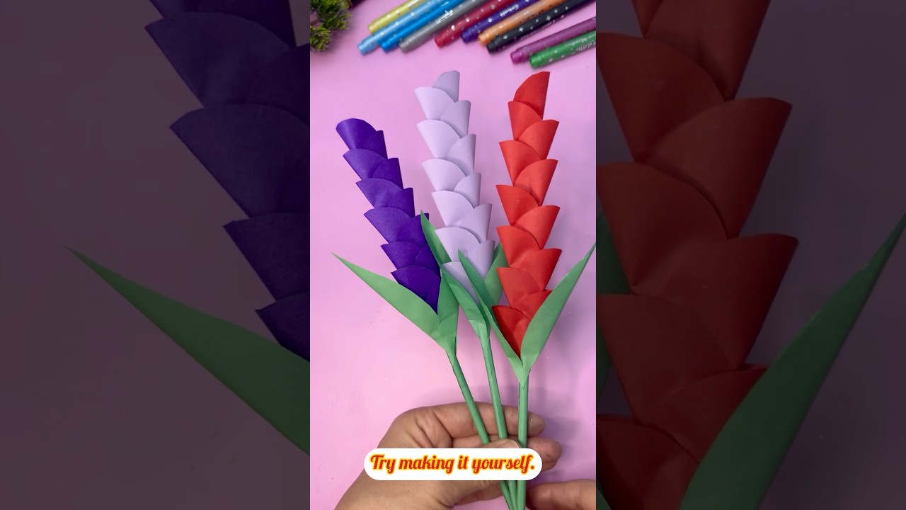 Learn to make flowers with different colored papers. 