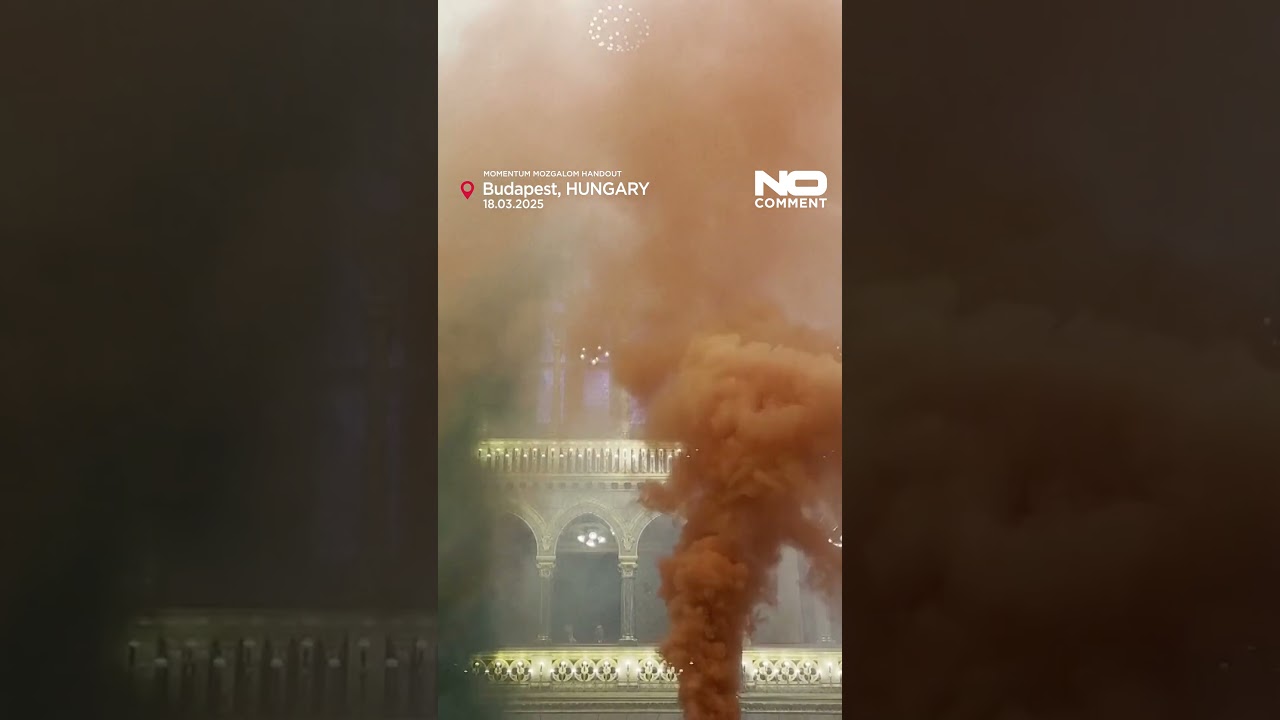 Opposition lawmakers in Hungary ignite smoke bombs while parliament passes law banning Pride events