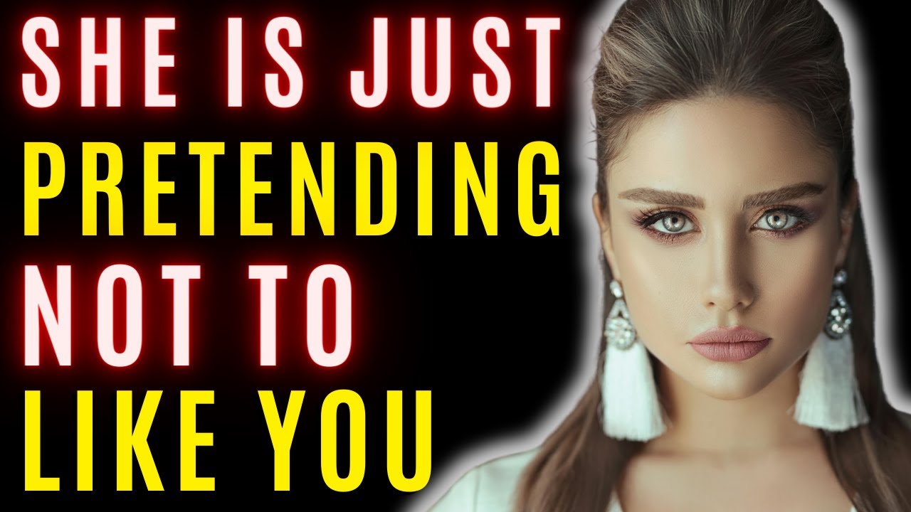 7 Signs She’s Pretending NOT to Like You (She’s Testing You)