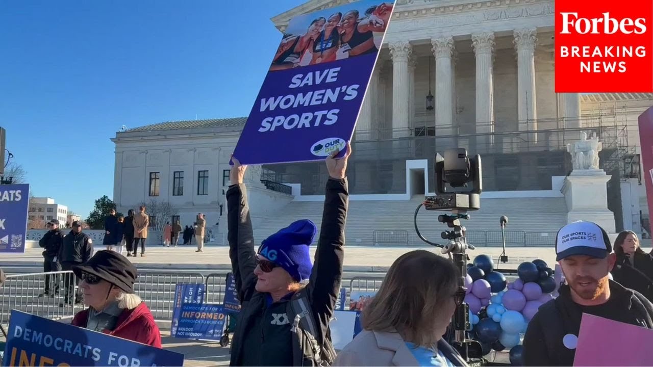 JUST IN: Protesters Gather Outside Of Supreme Court Building As Court Hears Cases On Trans Athletes
