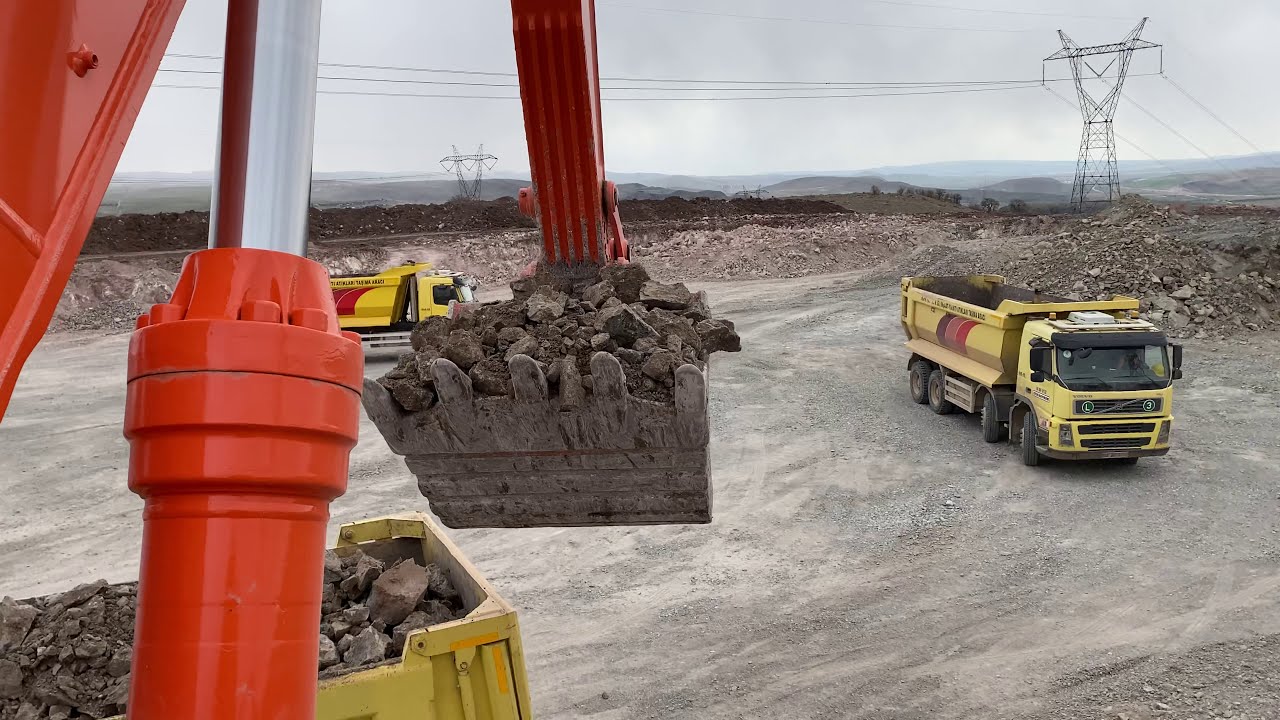Hitachi Excavator Trucks Loading