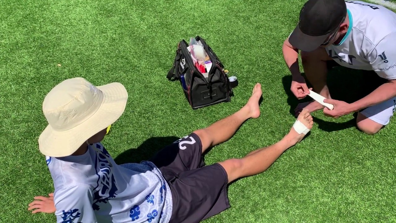 Big toe (1/2) assessment prior to taping for turf toe/sprains