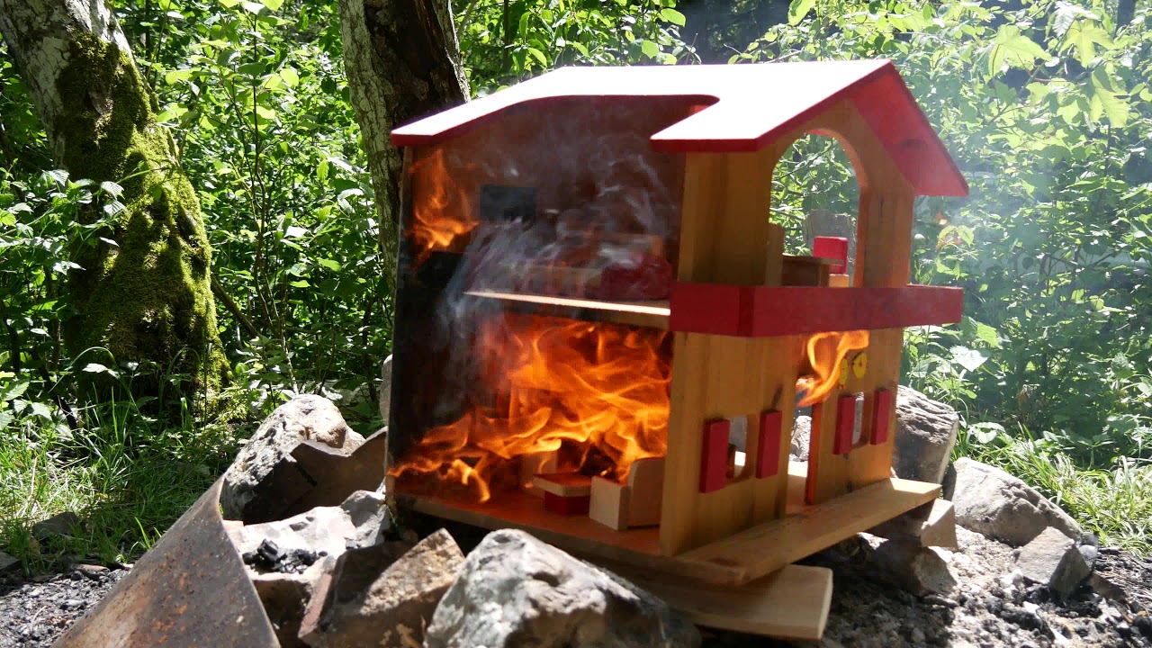 Burning dollhouse mountain chalet
