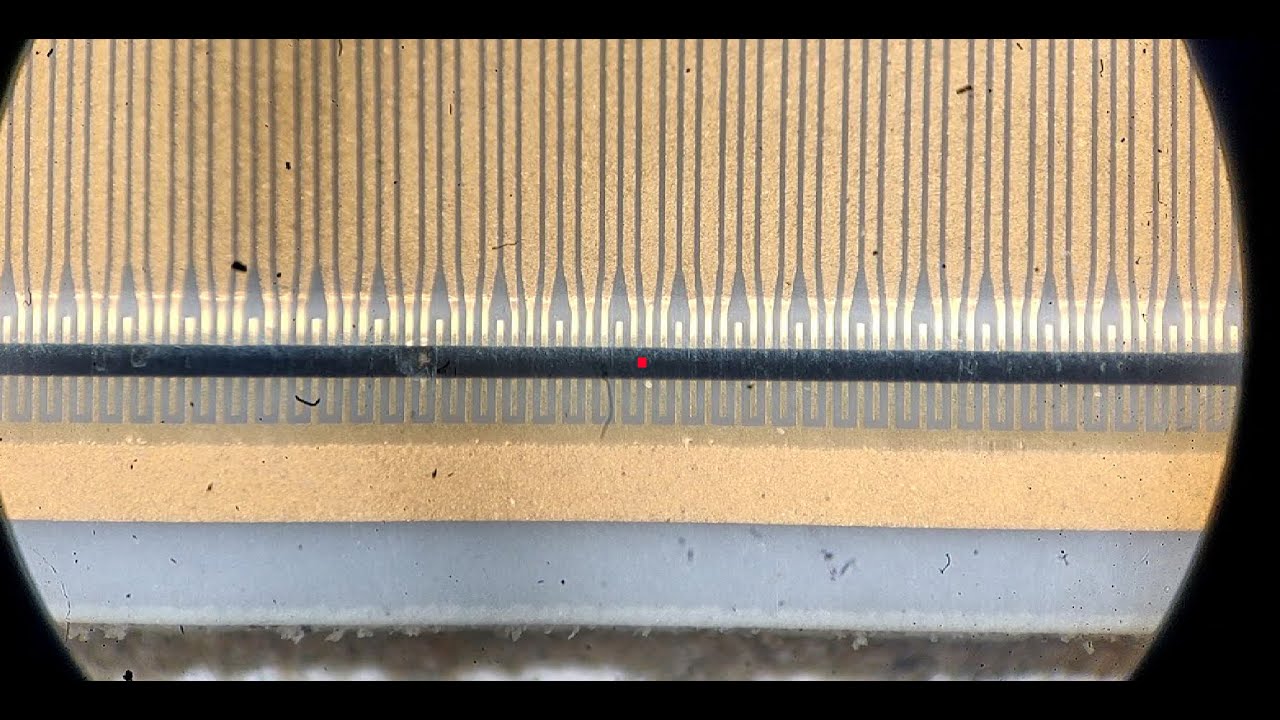 没有墨水的热敏打印机是怎么工作的？拆个打印头来了解一下