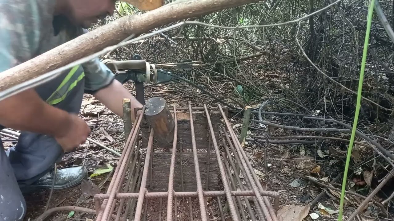 refazendo gatilho que capturou a paca