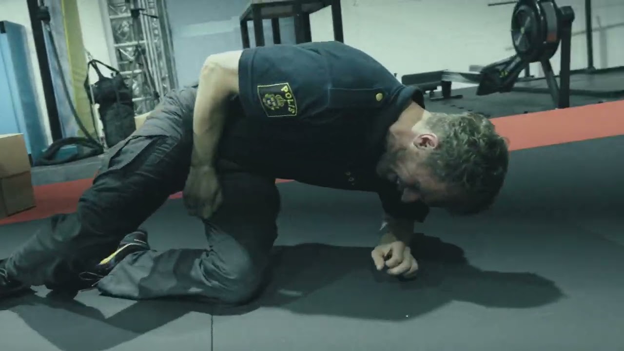 Stunt rehearsal - a policeman is chasing a policewoman
