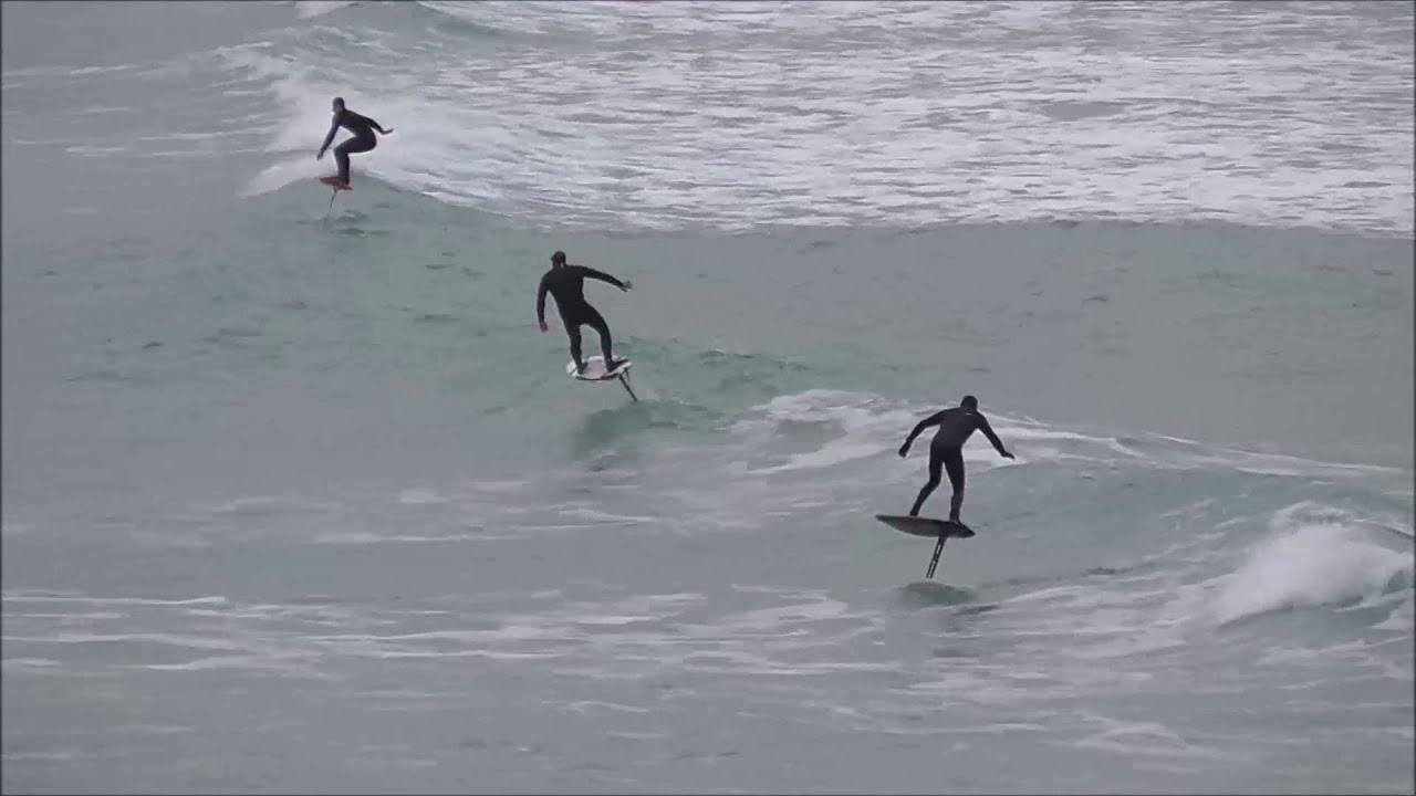 Foil surfing action Crantock, Cornwall