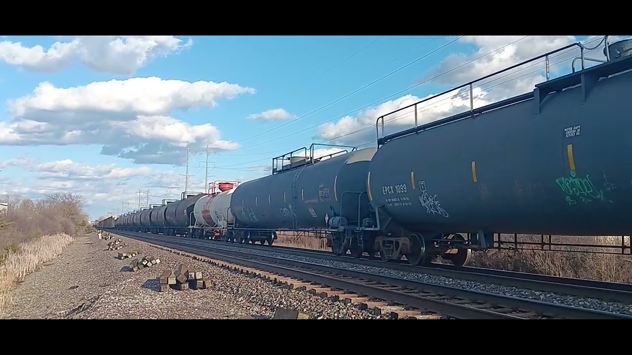 NS 4194 and NS 3675 pulls manifest train along with 5 SD70ACUs at Philipi Rd, OH. (3/12/26)