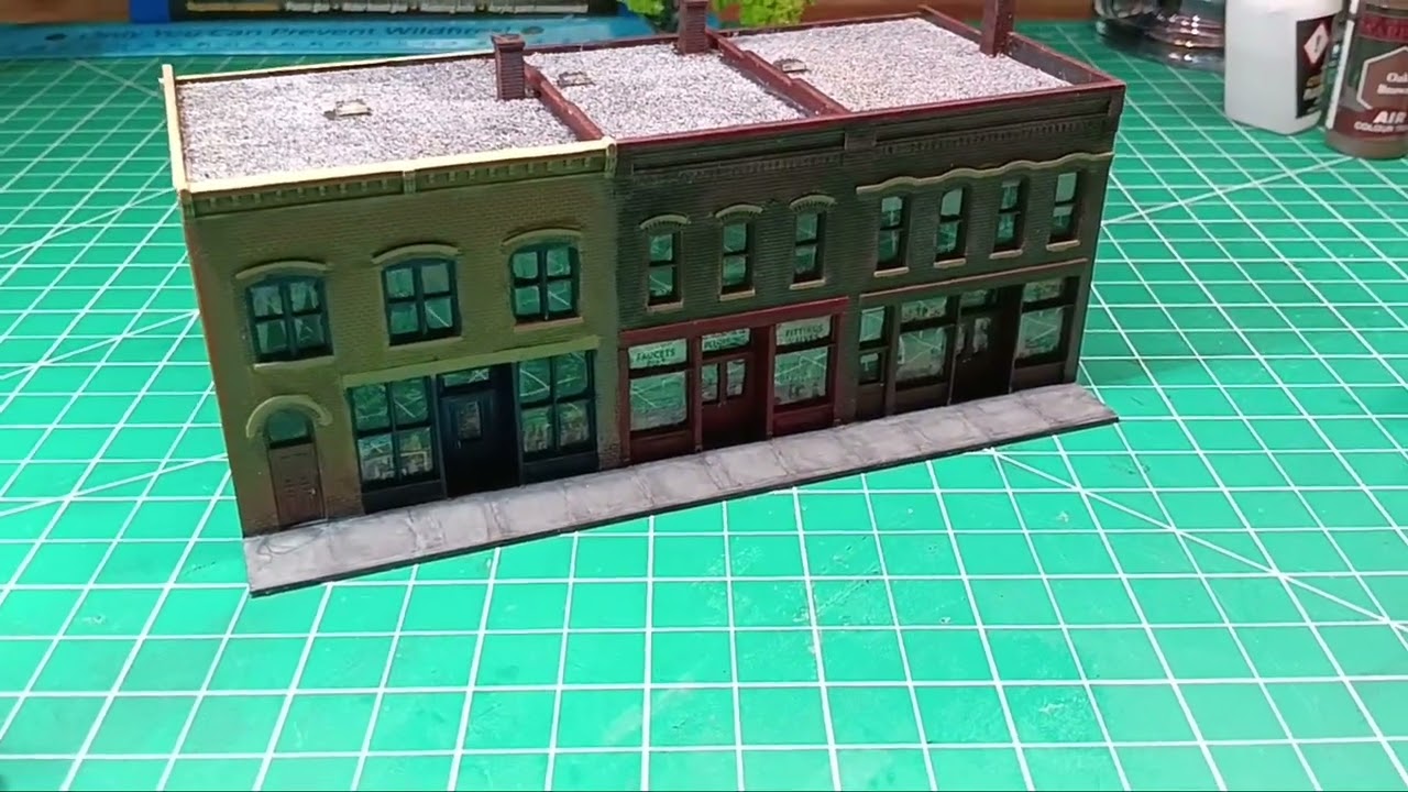 Finished my first N scale model building/buildings! Walthers Merchant's Row III