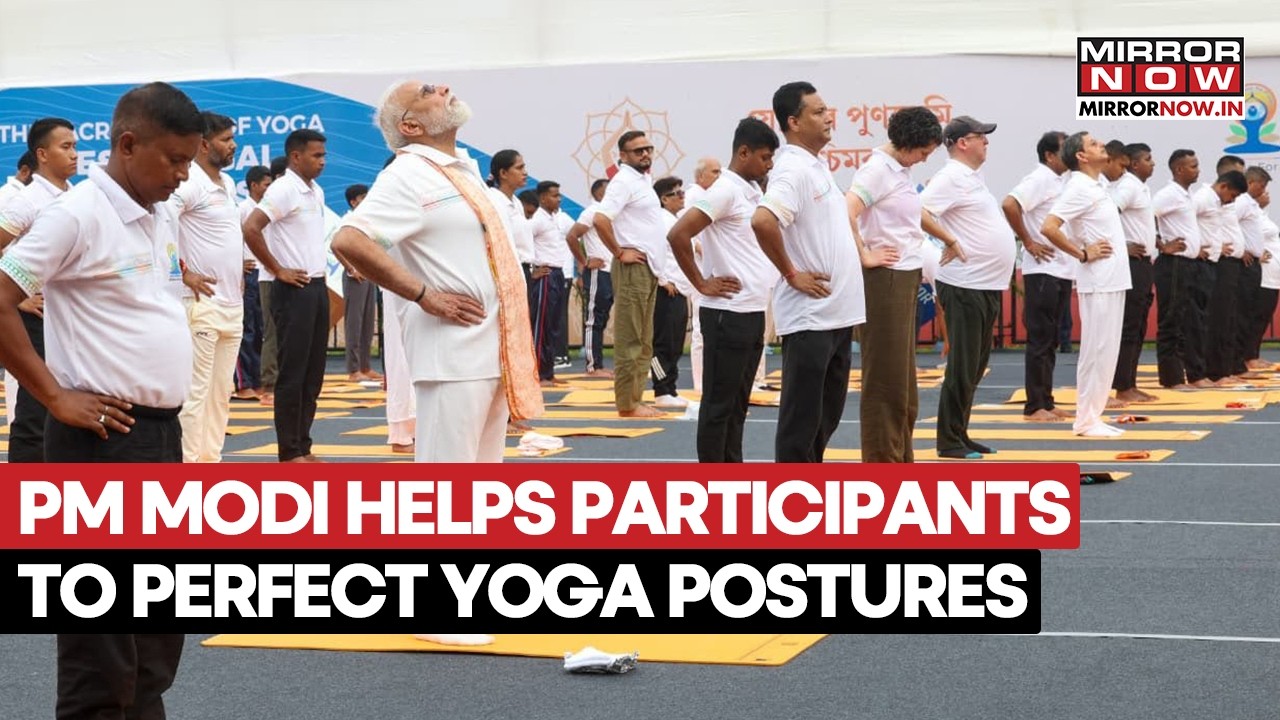 PM Modi Helps Participants To Perfect Their Posture On International Yoga Day In Kolkata | Watch