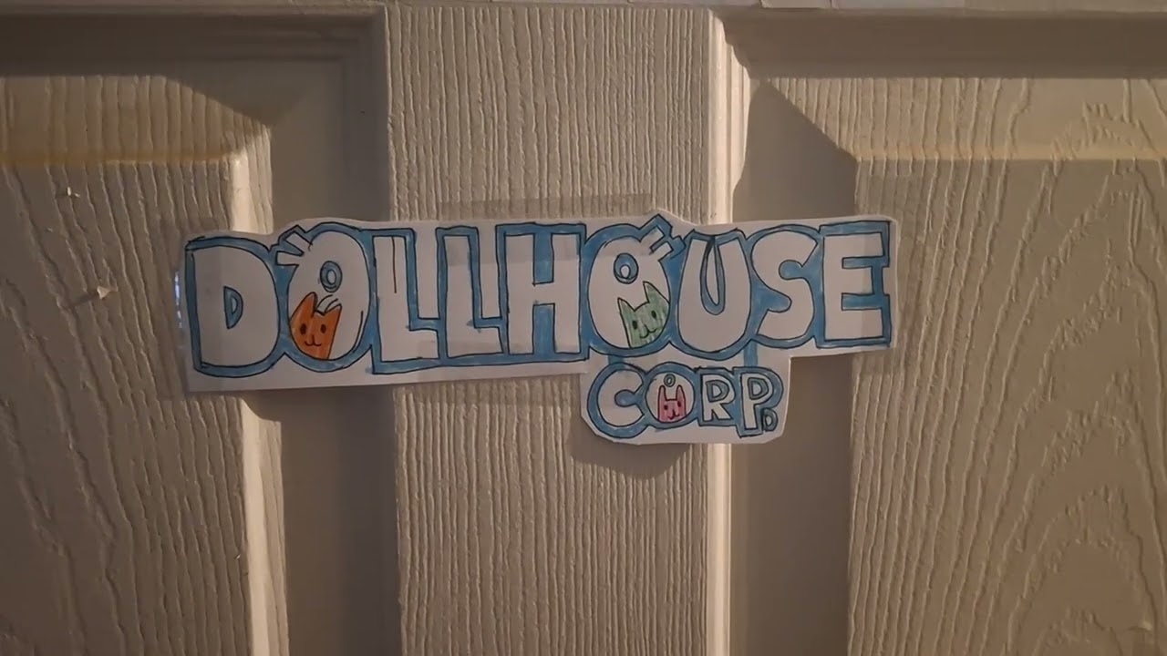 Dollhouse corp logo