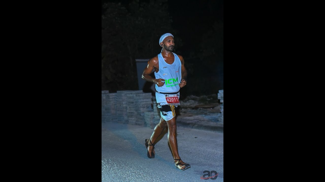 Marathon in barefoot sandals (chappal run) in traditional Maldivian outfit in Addu Marathon