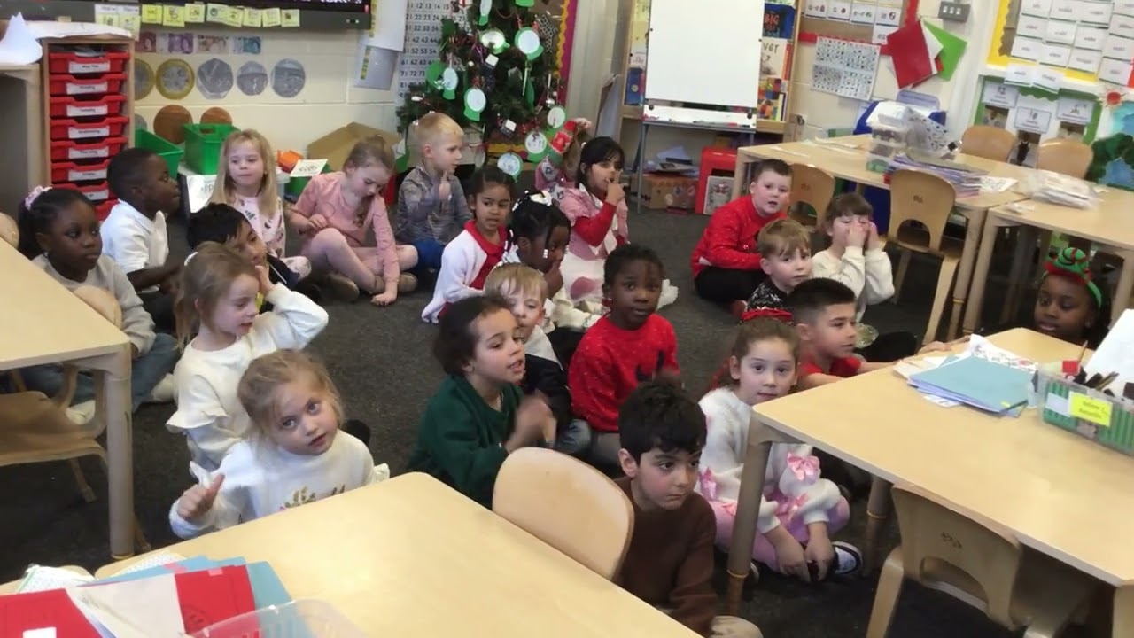 Boarshaw Primary Year 1 Dolphins singing When Santa Got Stuck Up The Chimney.
