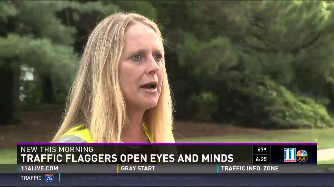 Female flaggers in Dunwoody turn heads, open minds - 11Alive