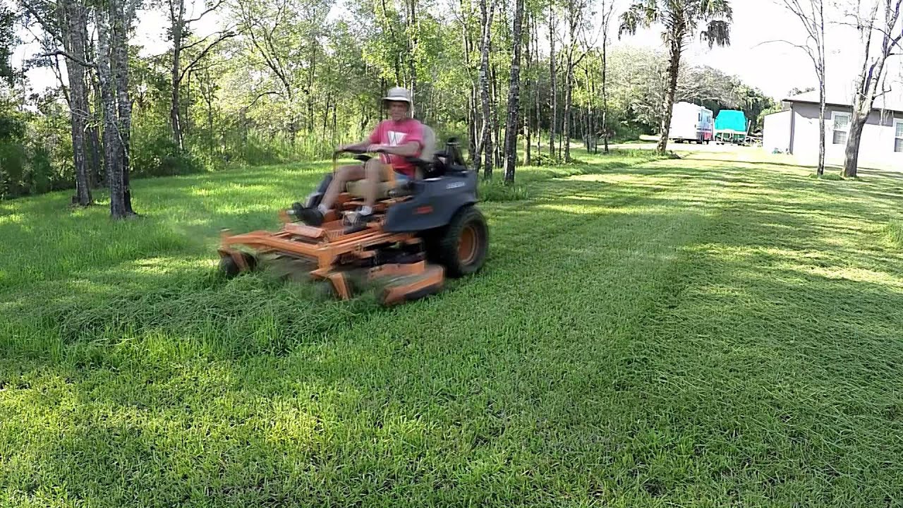 Mowing a big wet yard - Satisfying!