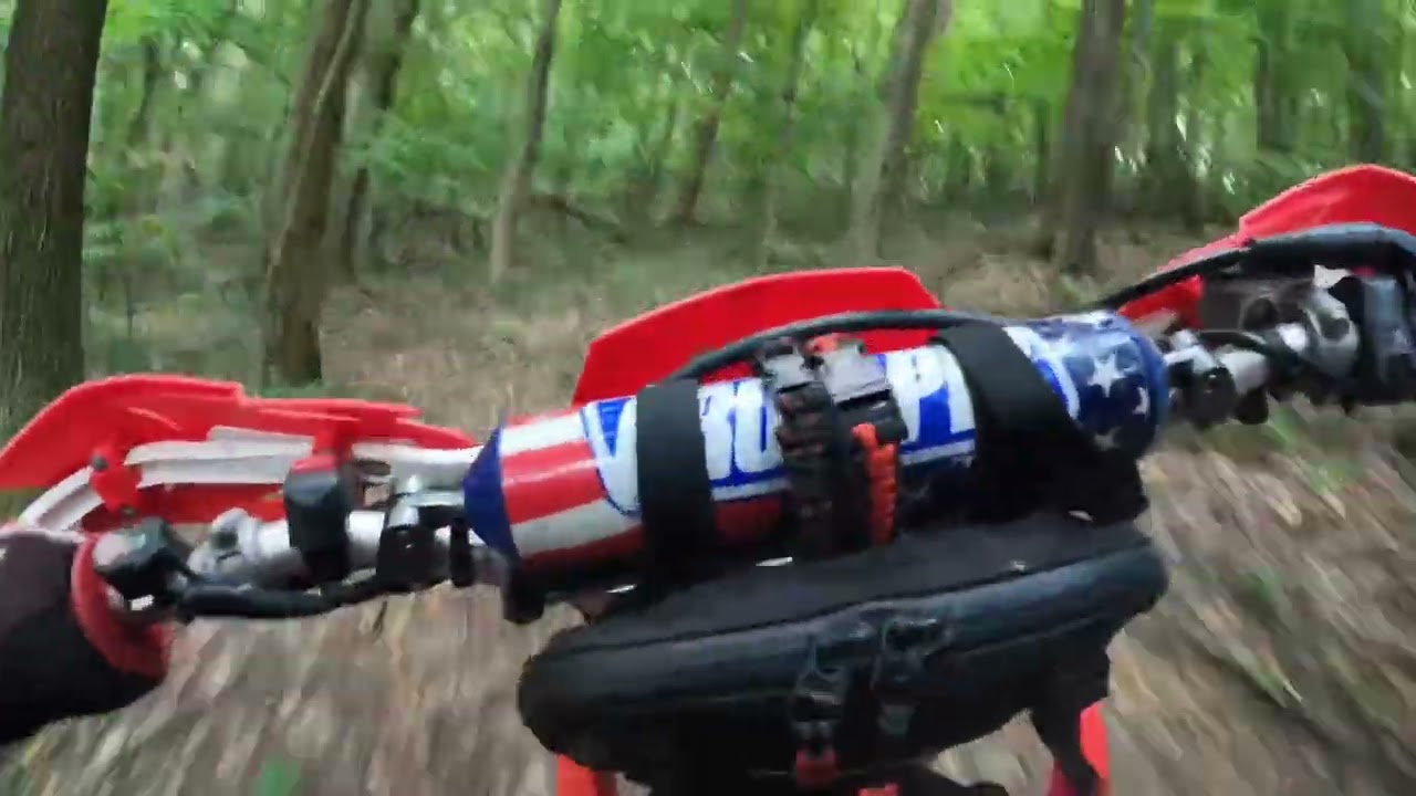 Riding dirt bike alongside a crf50 