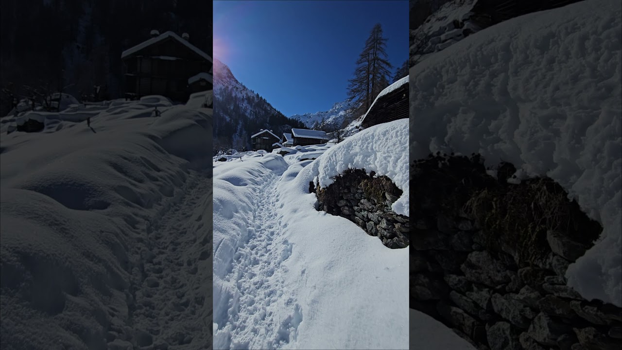 Raggiungiamo il primo villaggio alpino sommerso dalla neve