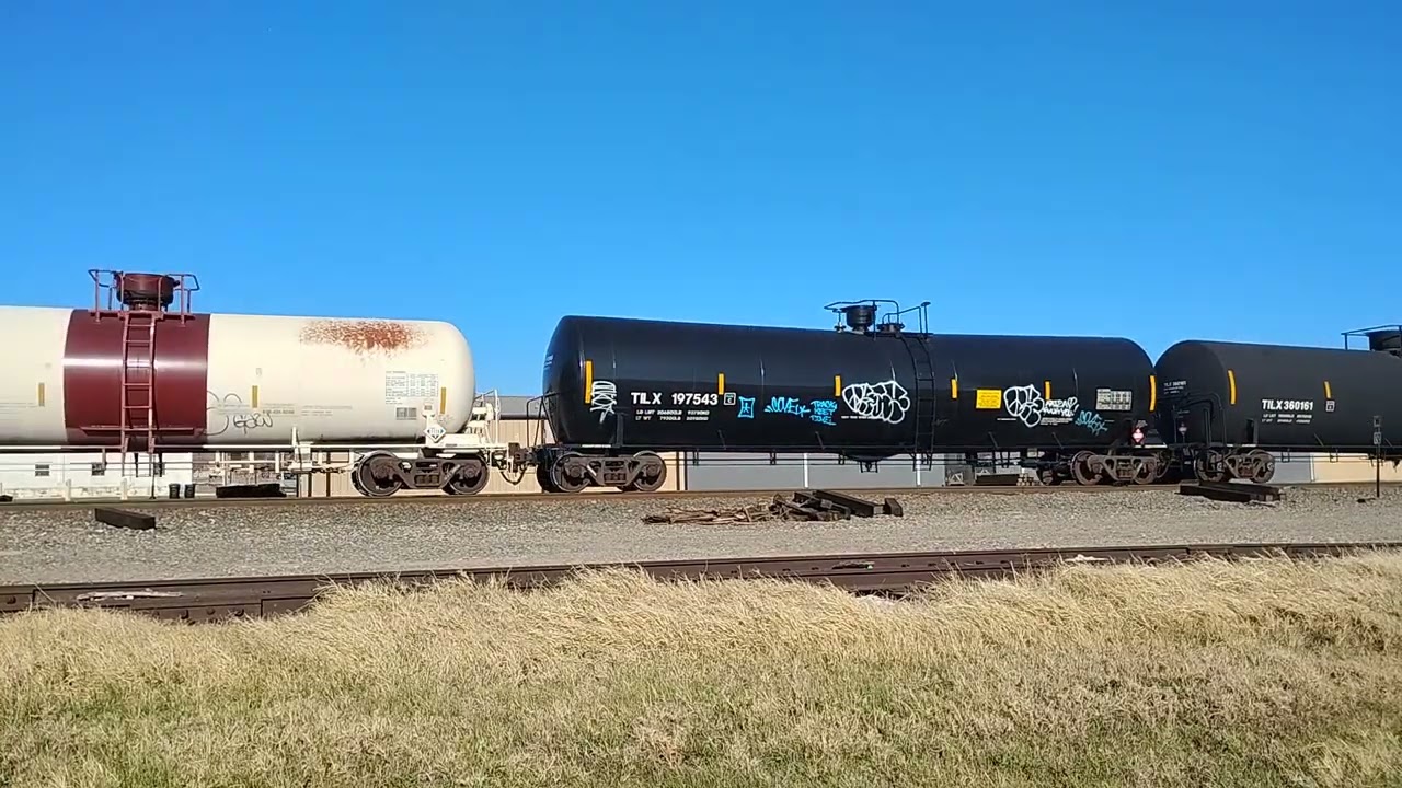 BNSF Eb manifest train with BNSF SD40-2 1666 trailing. Temple,Tx.  03/01/2026