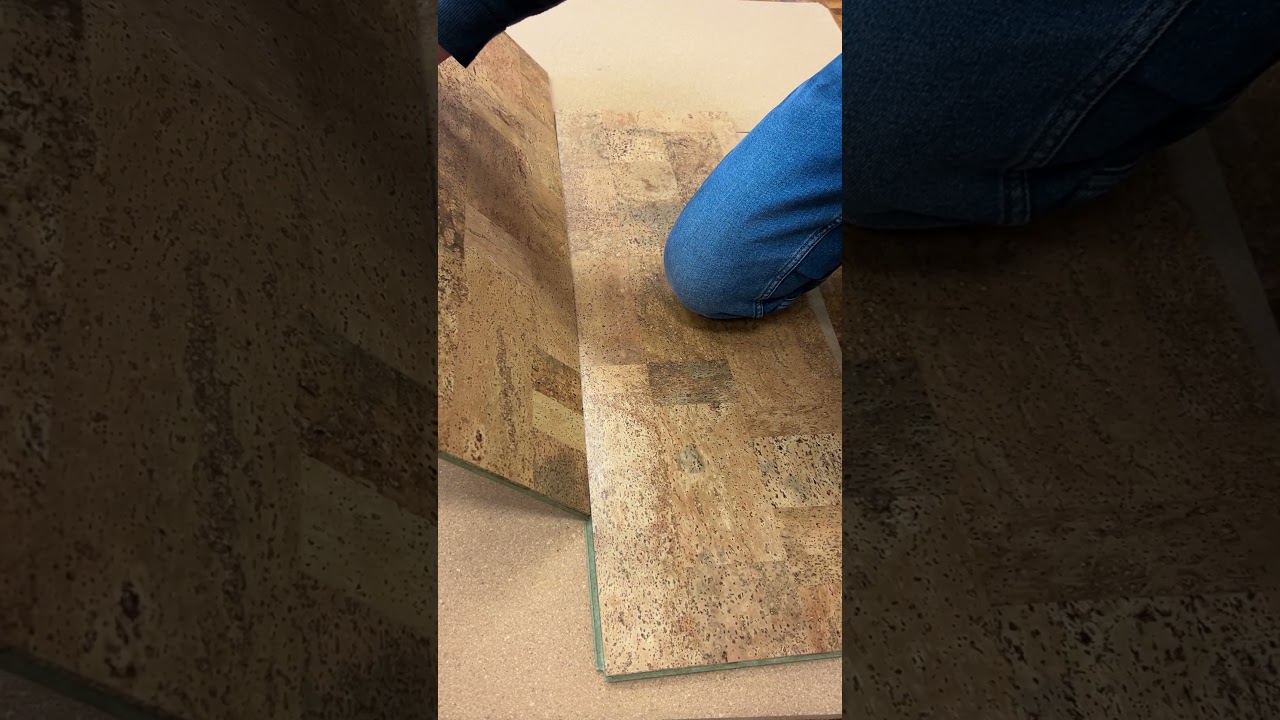 Effortless Elegance: Watch this cork floating floor click together! 🛠️🔗✨